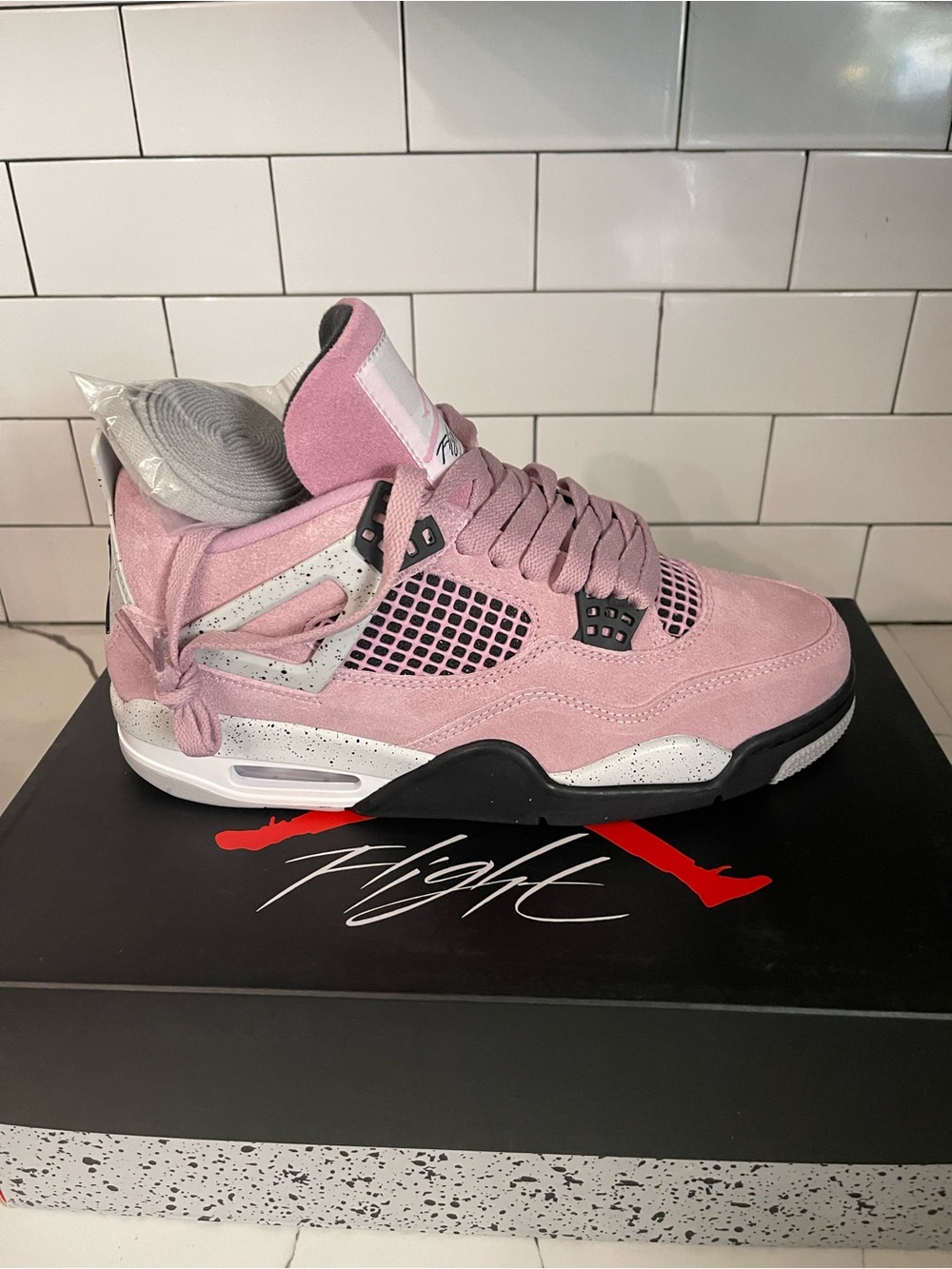 Men’s Retro 4 Pink Orchid Size 7.5.
